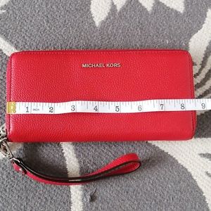 Red Michael kors wristlet